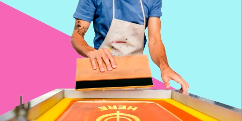 Manual screen printing on custom t-shirts in Miami