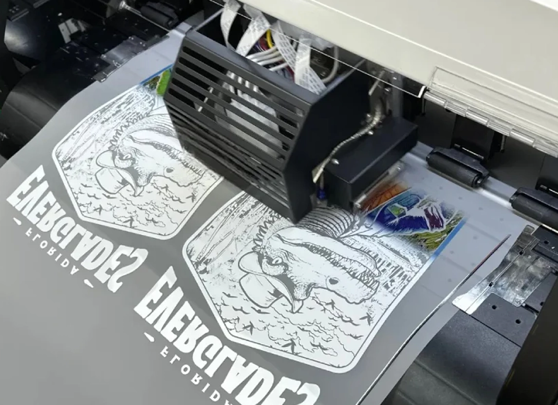 dtf printer printing custom design onto transfer film for apparel decoration